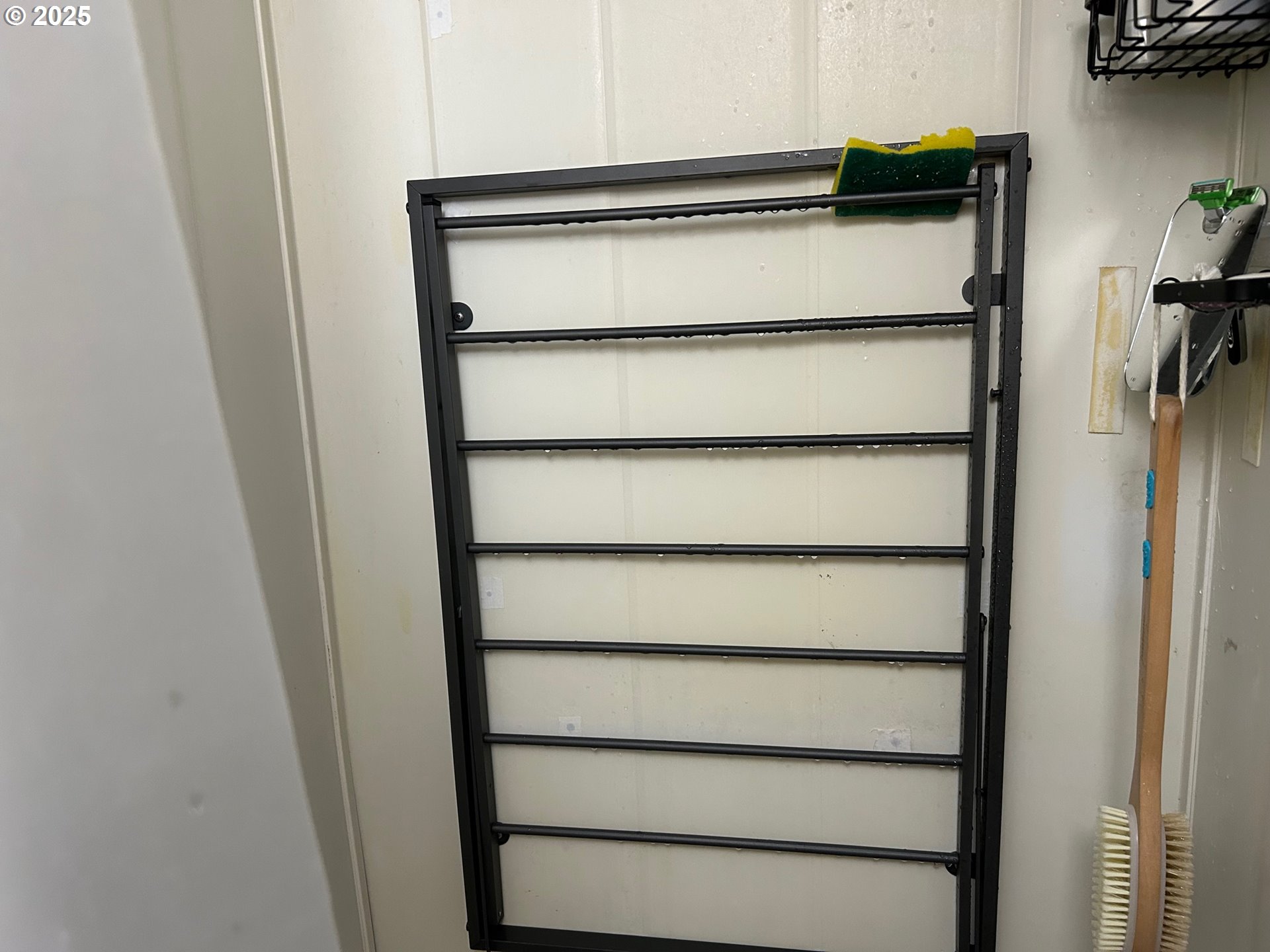 88433 2nd Avenue Florence, OR 97439 - Photo 19 of 25 a view of walk in closet with empty racks