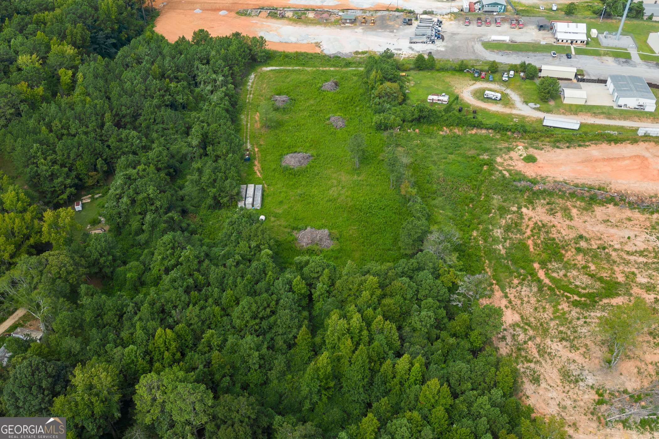 166 Highway Villa Rica, GA 30180 - Photo 4 of 8 a view of a big yard of a building