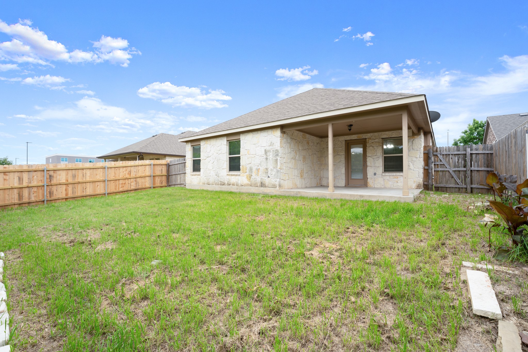 305 Longhorn Cavern Road Leander, TX 78641 - Photo 18 of 21 Spacious backyard! Ready for play and your finishing touches.