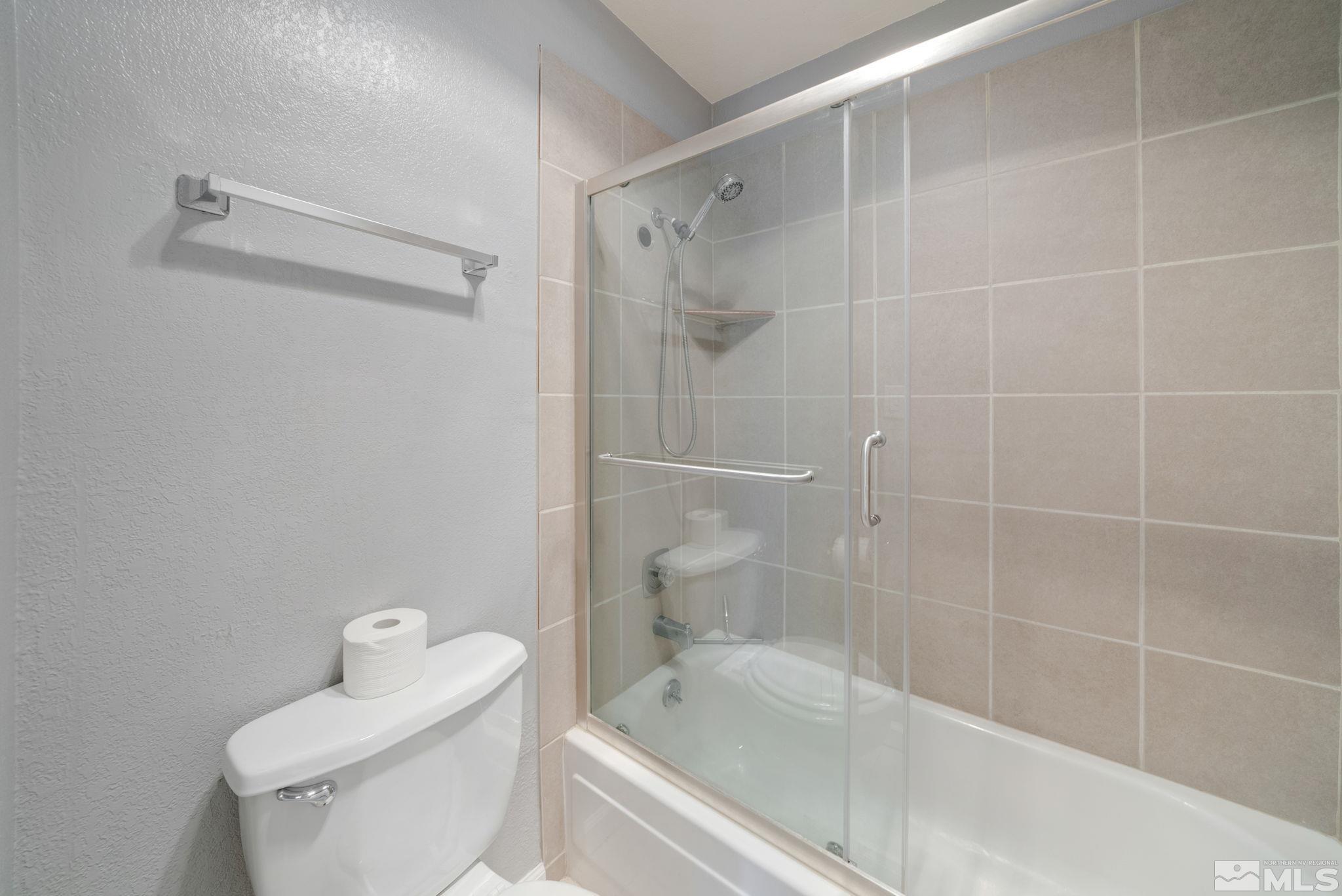 2450 Lymbery Street, Unit 227 Reno, NV 89509 - Photo 10 of 14 a bathroom with a shower and toilet