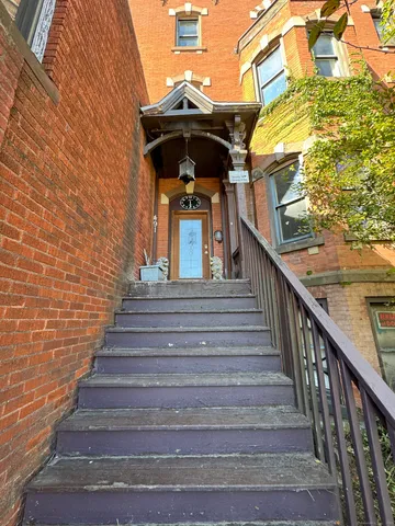 a view of entryway with a front door