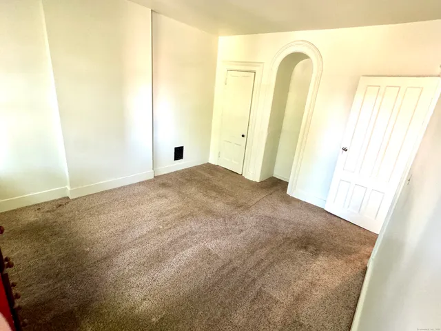 a view of a livingroom with a fireplace