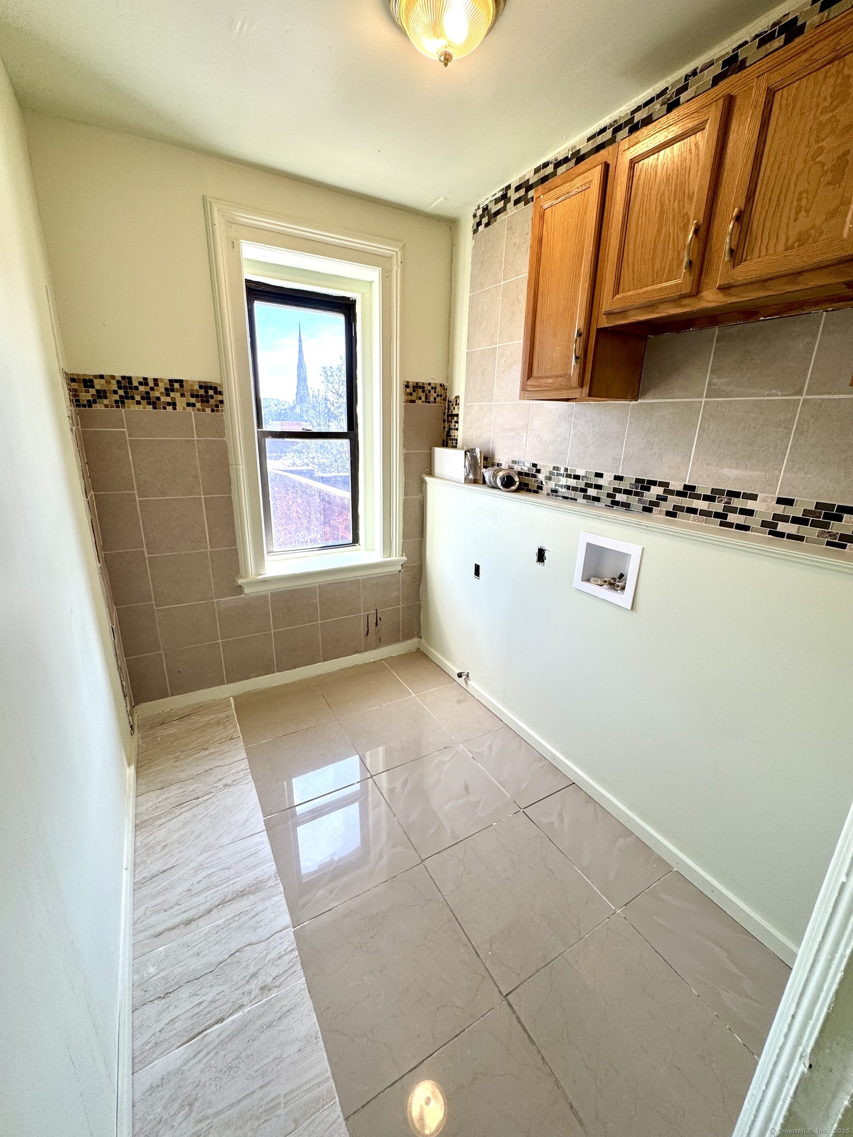 491 Meadow Street Waterbury, CT 06702 - Photo 8 of 12 a view of utility room