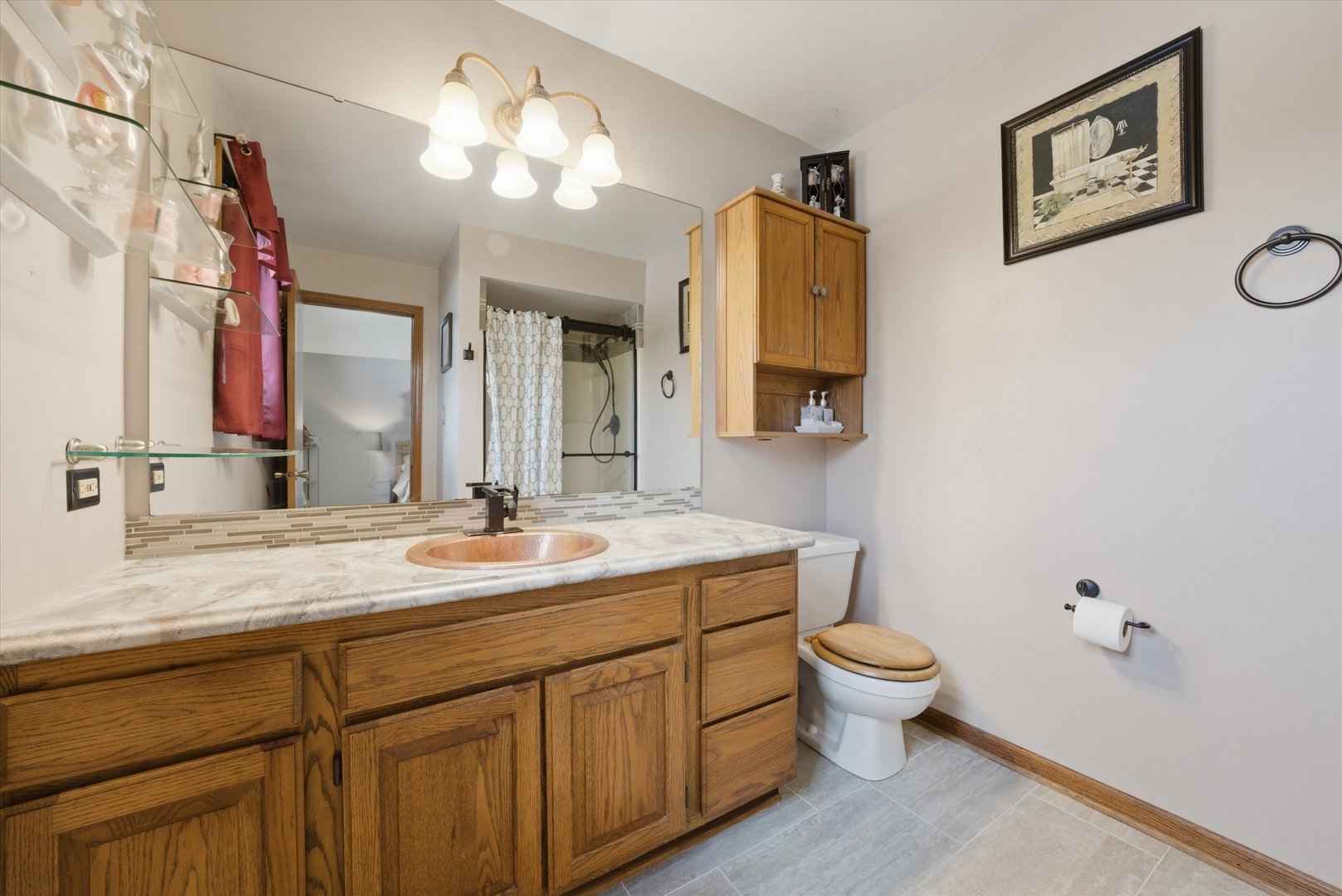 3552 Fairway Drive Crete, IL 60417 - Photo 14 of 27 a bathroom with a toilet sink and mirror