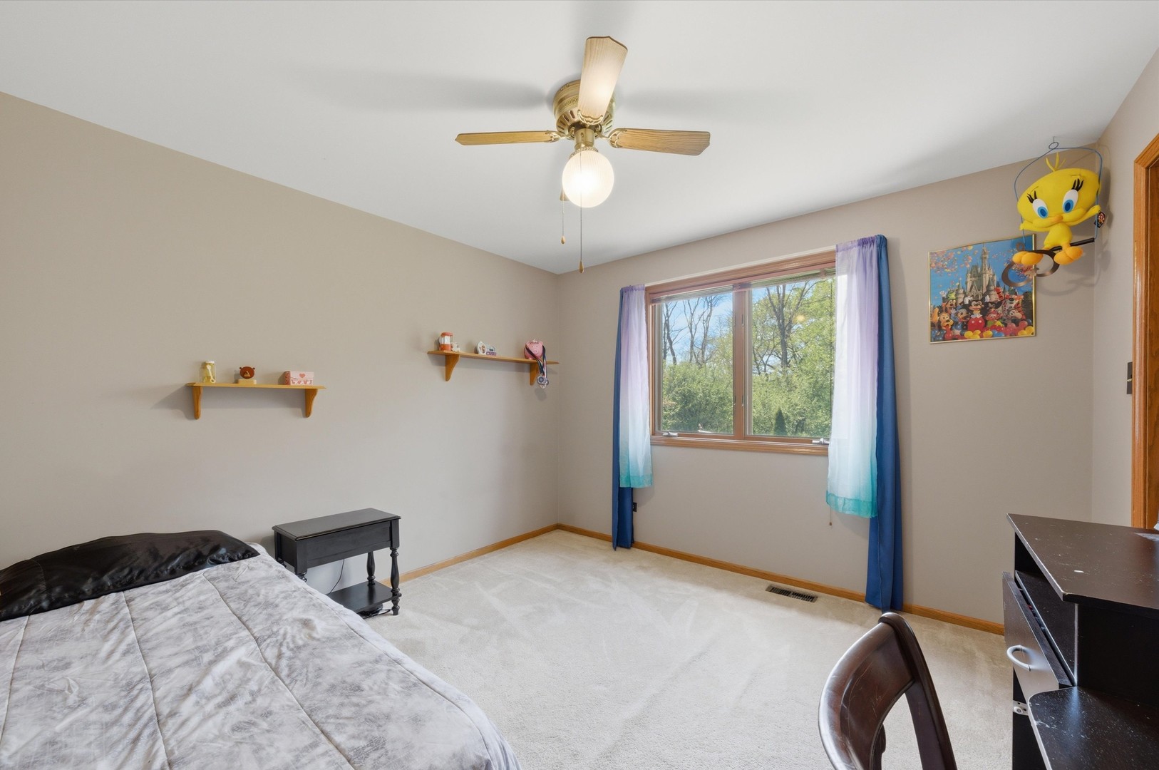 3552 Fairway Drive Crete, IL 60417 - Photo 16 of 27 a bedroom with a bed and a chandelier