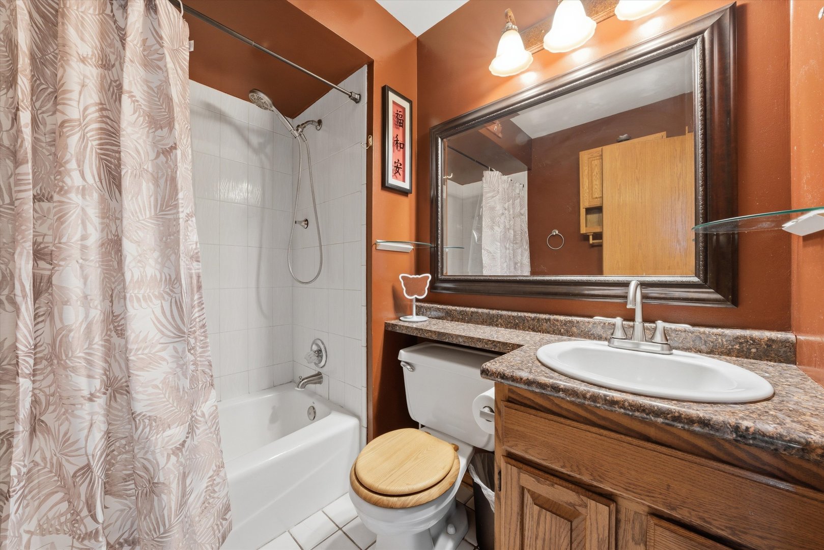 3552 Fairway Drive Crete, IL 60417 - Photo 18 of 27 a bathroom with a granite countertop sink toilet a mirror and shower