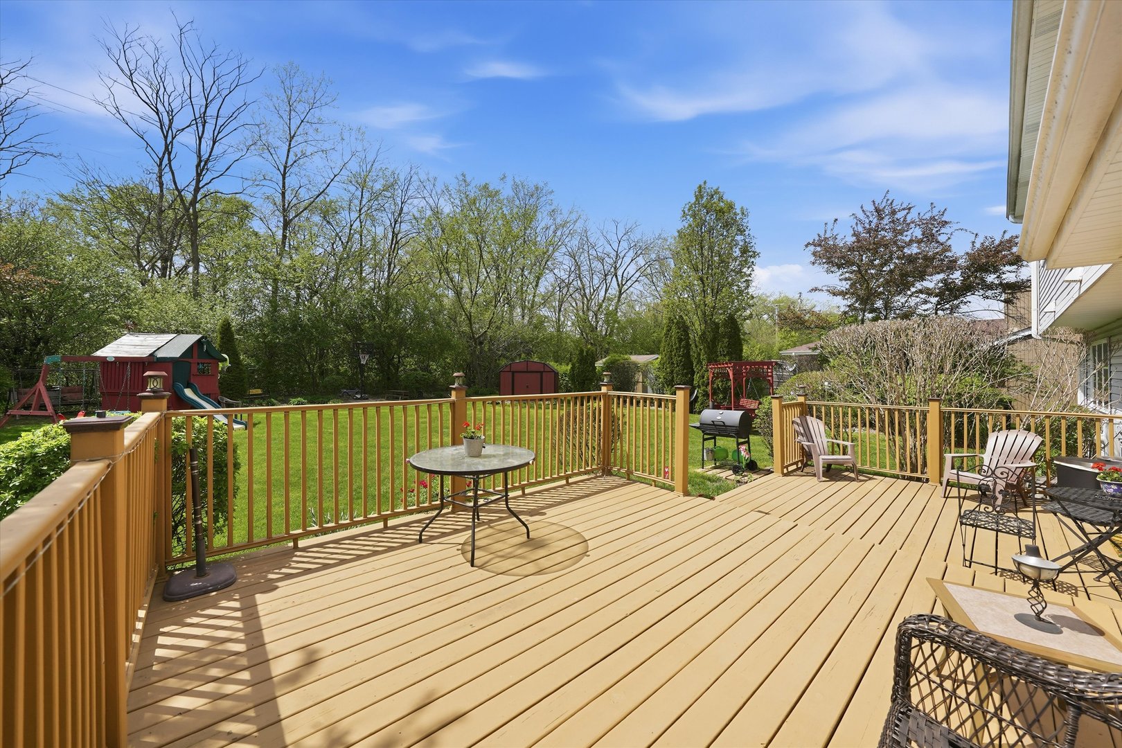 3552 Fairway Drive Crete, IL 60417 - Photo 26 of 27 a view of a house with wooden deck and furniture
