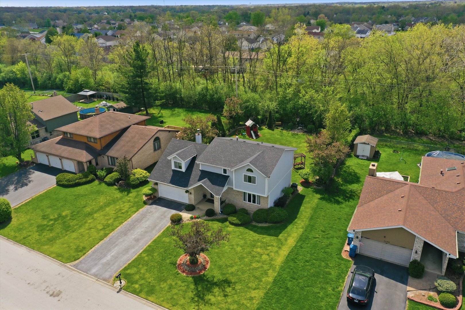 3552 Fairway Drive Crete, IL 60417 - Photo 27 of 27 an aerial view of a house with a garden