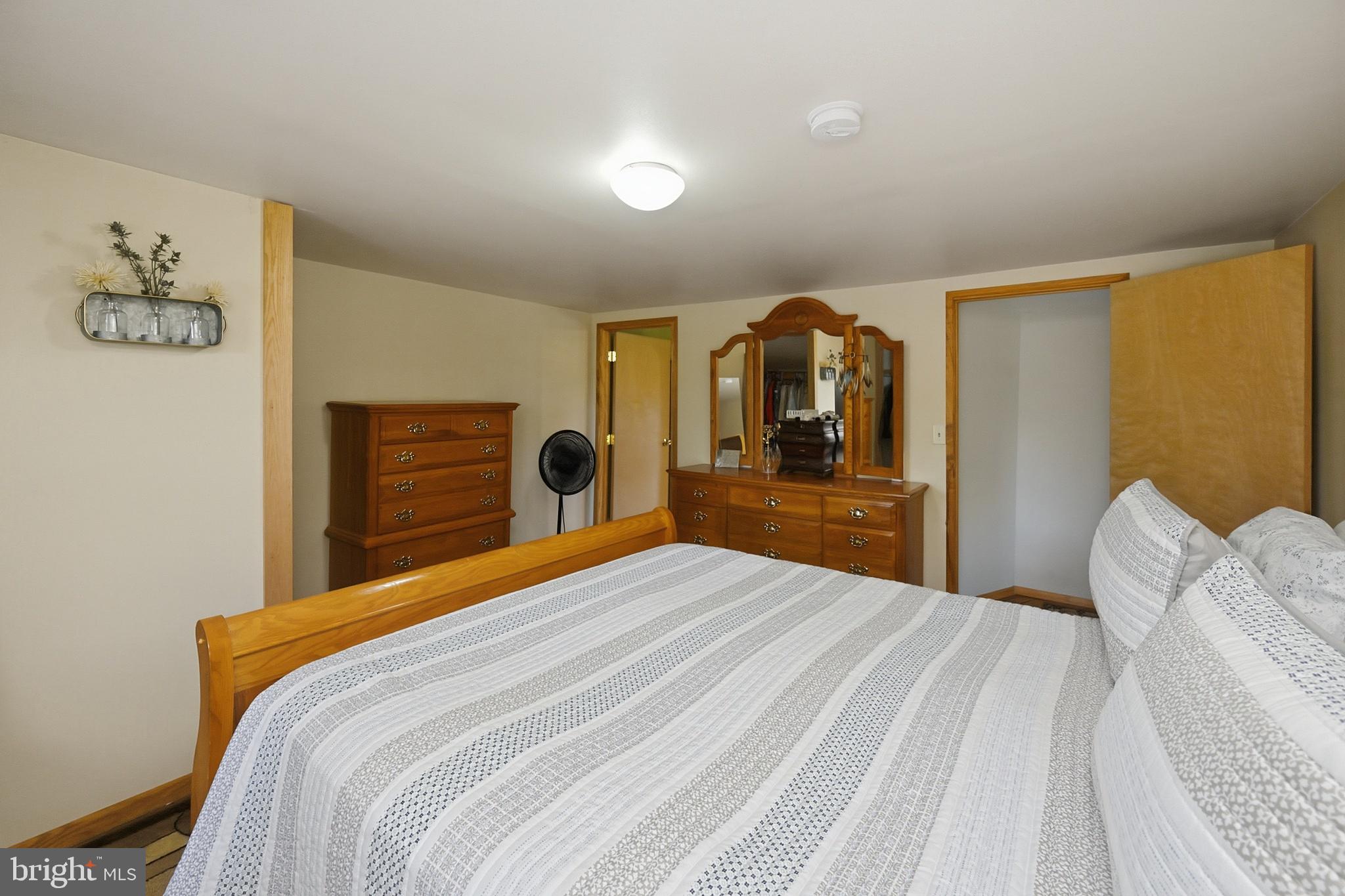 265 Fearer Road Friendsville, MD 21531 - Photo 31 of 75 Cozy bedroom with warm wooden accents.