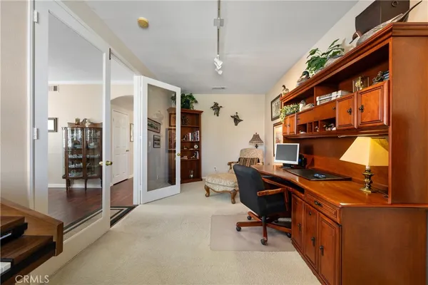 a view of a workspace with furniture