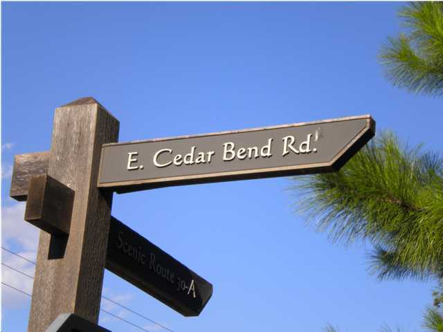 1 East Cedar Bend Road Santa Rosa Beach, FL 32459 - Photo 1 of 5 a sign that is on the wall of a building