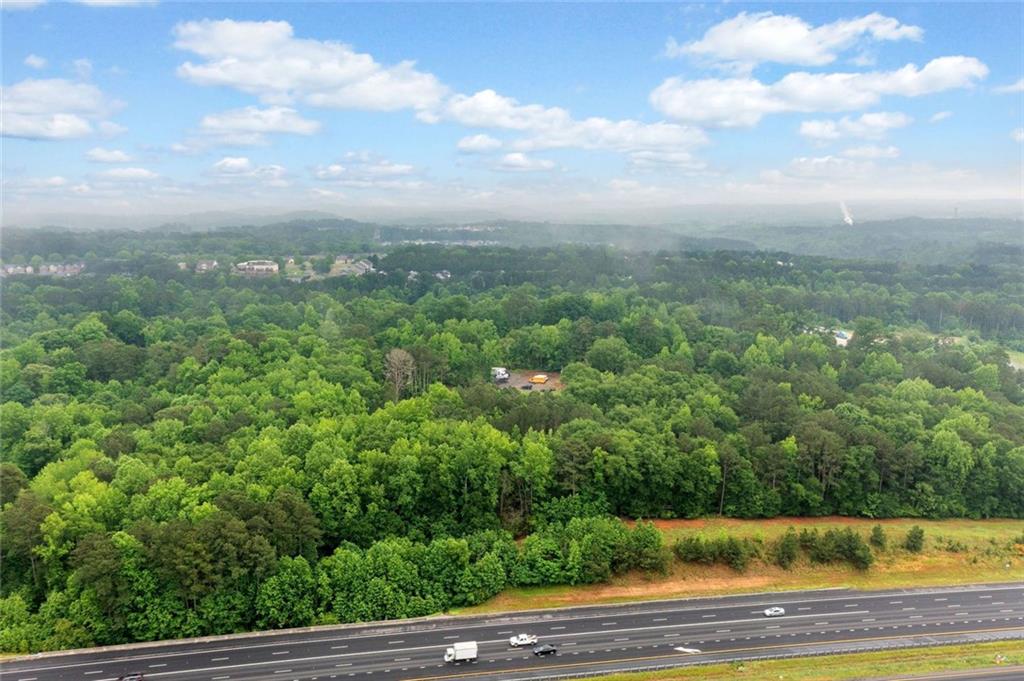 643 North Rope Mill Road Woodstock, GA 30188 - Photo 2 of 7 a view of a yard