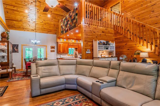 a view of a patio with couches and a coffee table