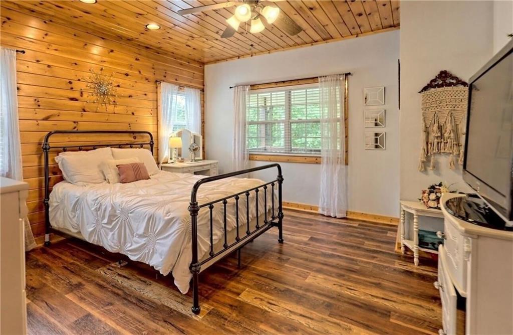 292 High Country Crossing Morganton, GA 30560 - Photo 23 of 35 a bedroom with a bed next to a window with the outer view