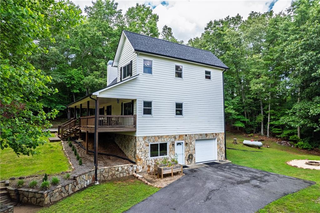 292 High Country Crossing Morganton, GA 30560 - Photo 7 of 35 a view of a house with a yard and sitting area