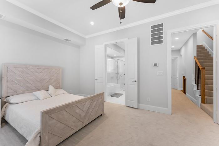 633 Dalton Lane Irving, TX 75039 - Photo 13 of 26 a bedroom with a bed and a chandelier