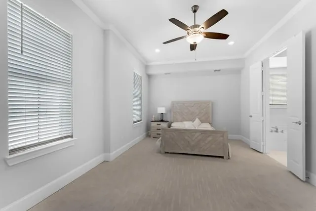 a living room with furniture and white walls