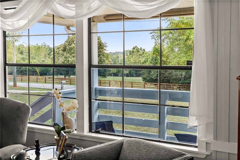 1689 Old State Road Pendergrass, GA 30567 - Photo 31 of 58 a room with a large window