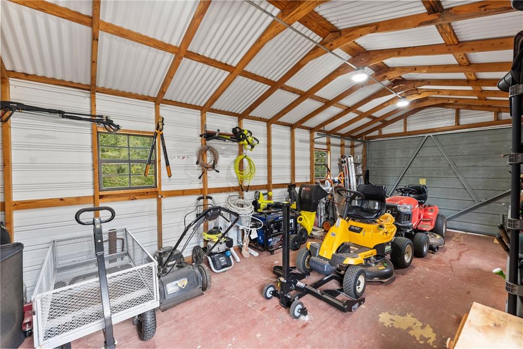 1689 Old State Road Pendergrass, GA 30567 - Photo 41 of 58 a view of a room with gym equipment