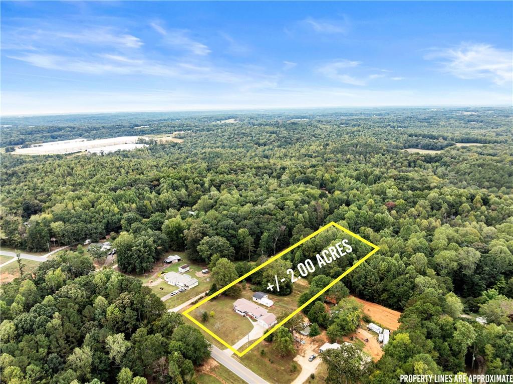 1689 Old State Road Pendergrass, GA 30567 - Photo 46 of 58 an aerial view of residential house with an outdoor space and seating