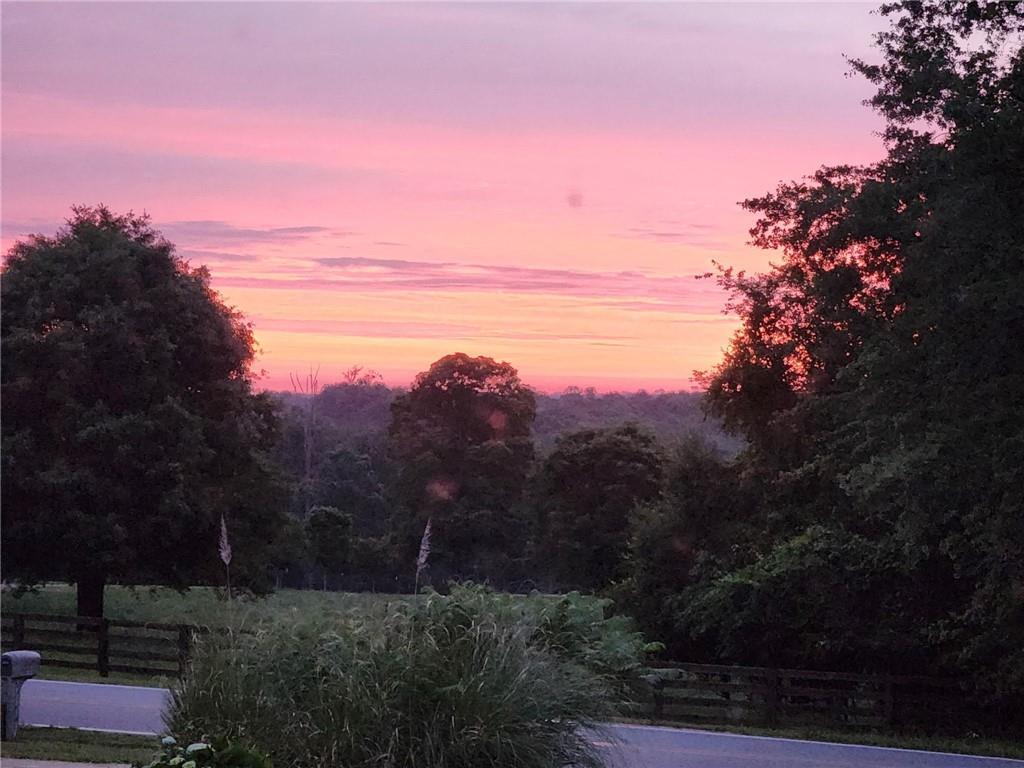 1689 Old State Road Pendergrass, GA 30567 - Photo 54 of 58 a view of mountain with sunset in background