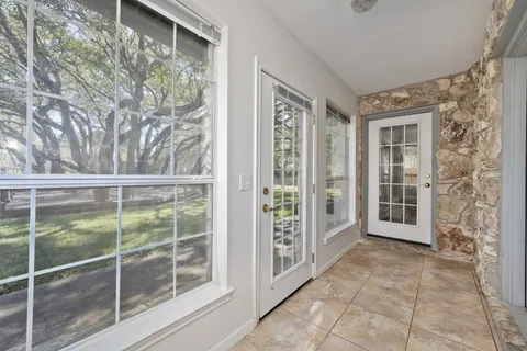 a view of a room with a large window