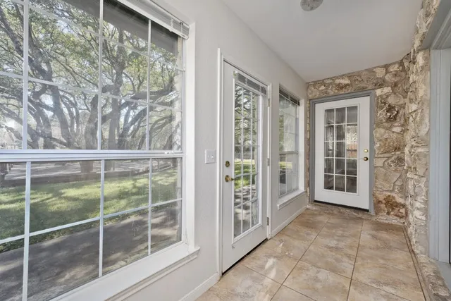 a view of a room with a large window