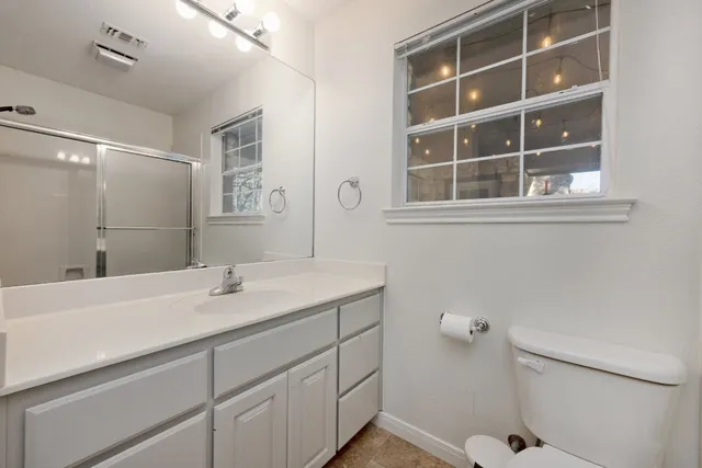 a bathroom with a sink and a vanity