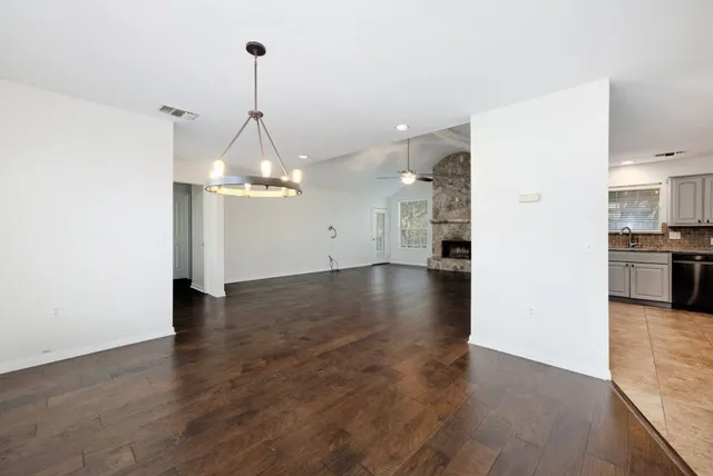 a view of a kitchen with a sink and dishwasher