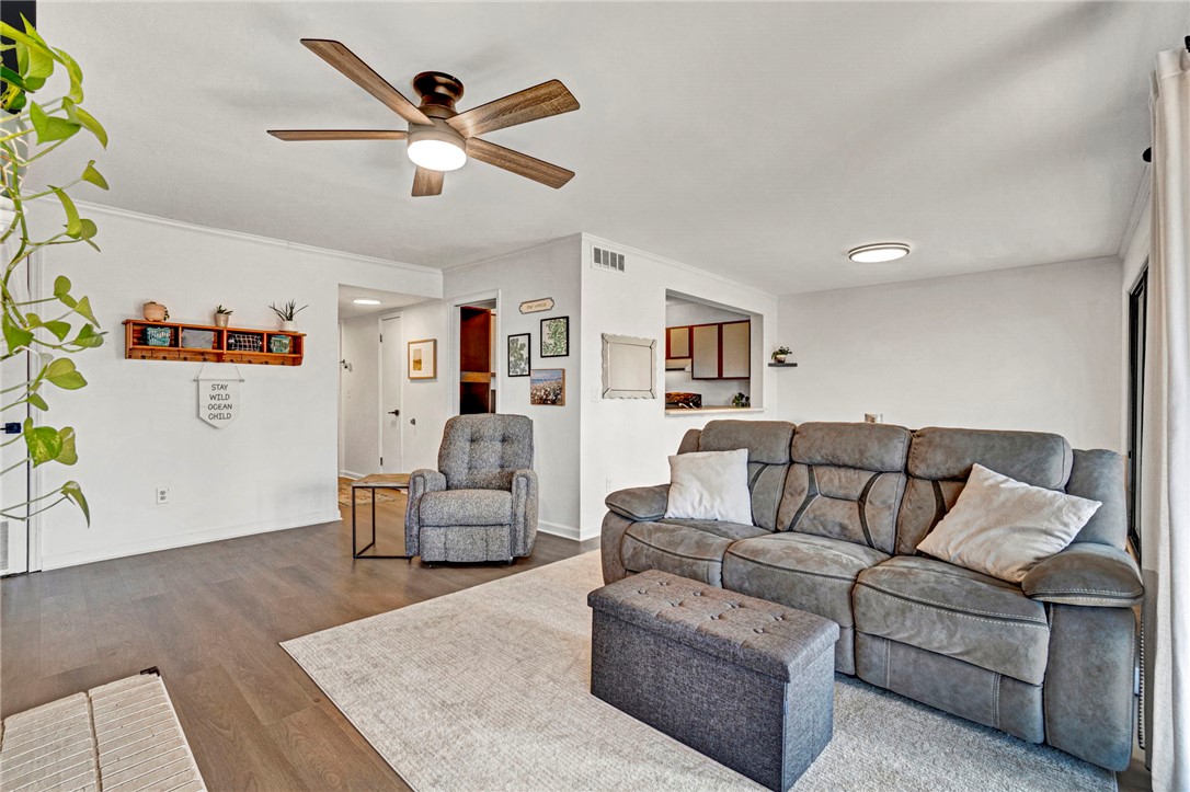104 Captains Way Anderson, SC 29625 - Photo 26 of 47 This inviting living area features warm flooring and ample space for relaxation and gatherings.