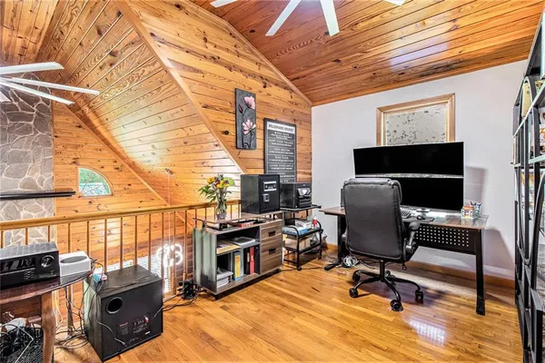 a view of a workspace with furniture