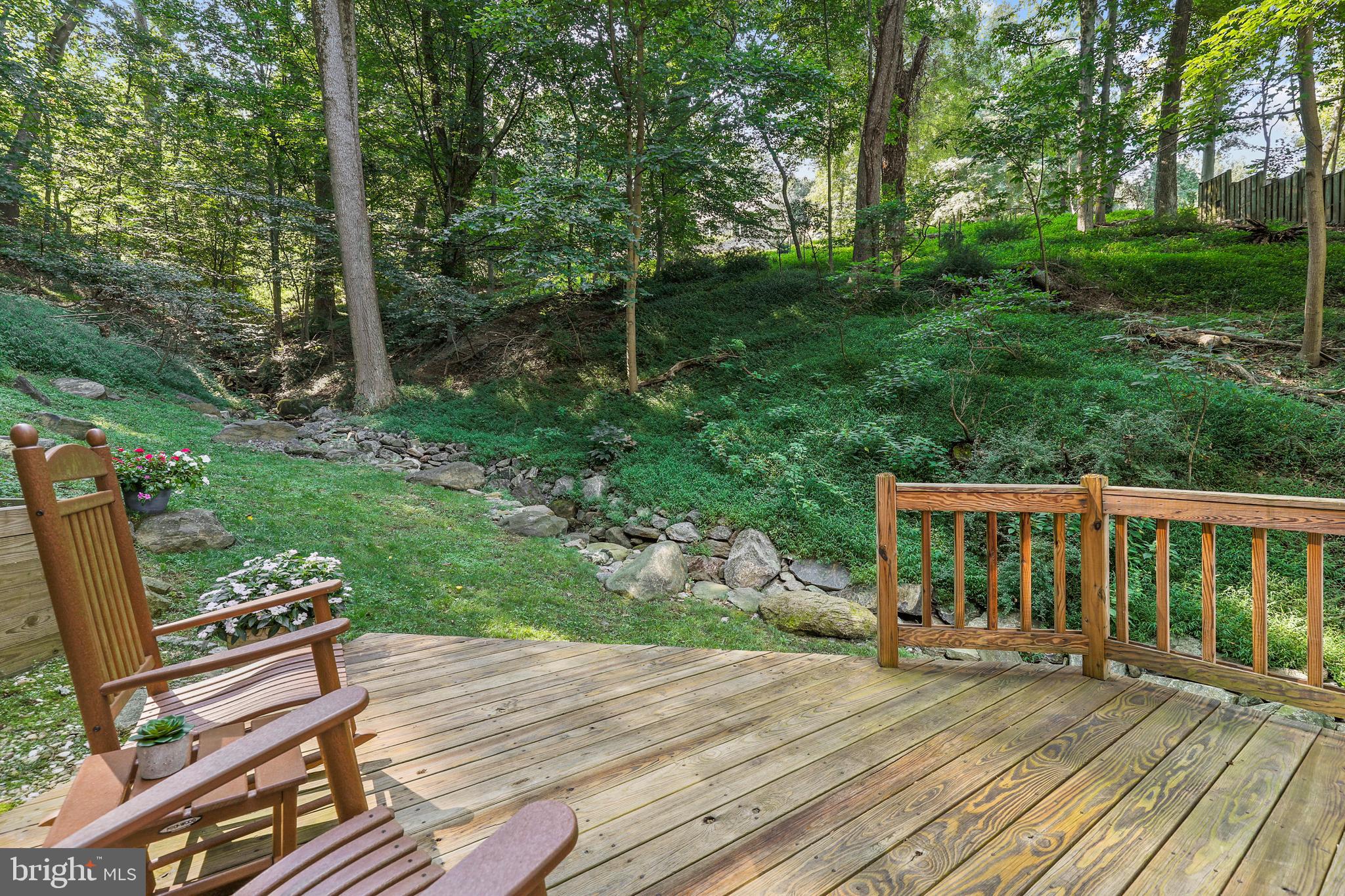 919 Logtown Road Ellicott City, MD 21043 - Photo 54 of 98 Rear Deck off Family Room covered by lush trees.