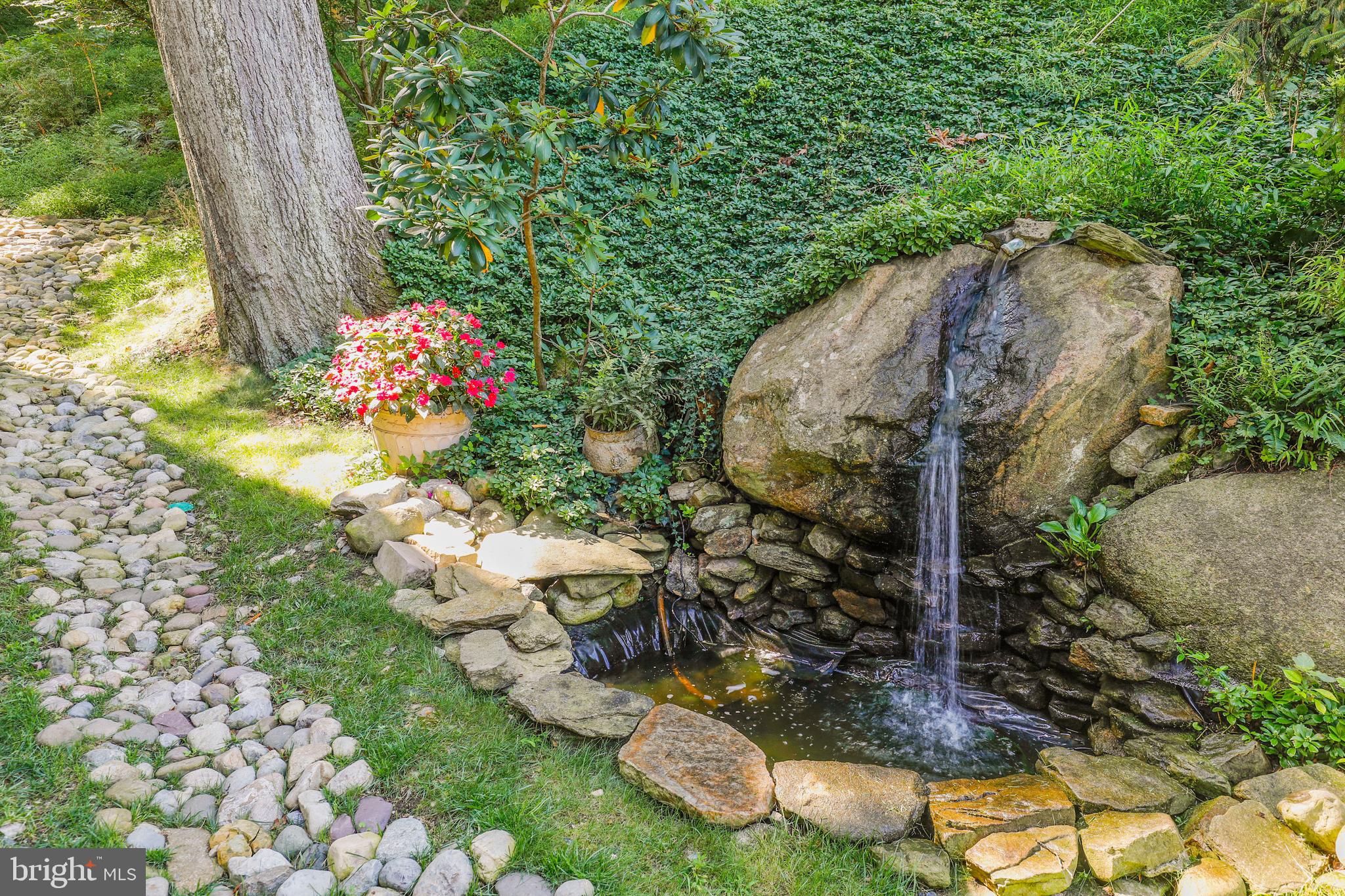 919 Logtown Road Ellicott City, MD 21043 - Photo 7 of 98 Relax by the sounds of your own waterfall.