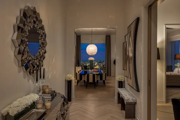 a room with furniture and a flat screen tv