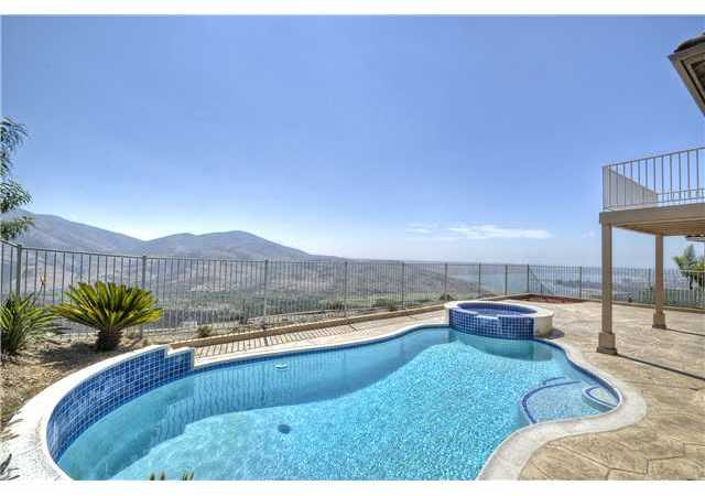 2033 Pointe Parkway Spring Valley, CA 91978 - Photo 22 of 25 View of heated pool, yard and balcony from master bedroom.