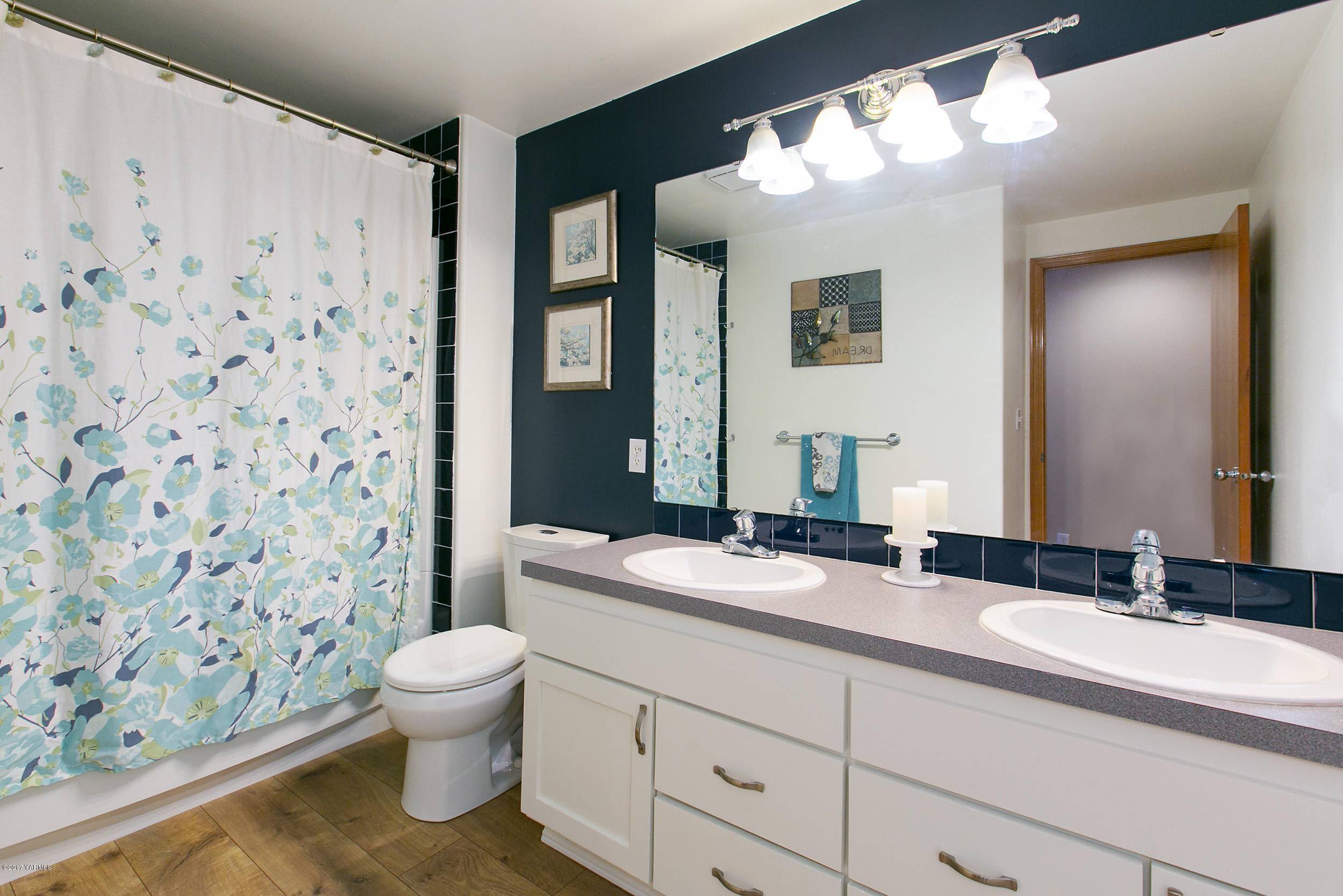3603 Marks Road Yakima, WA 98903 - Photo 14 of 31 a bathroom with a granite countertop sink mirror vanity and toilet