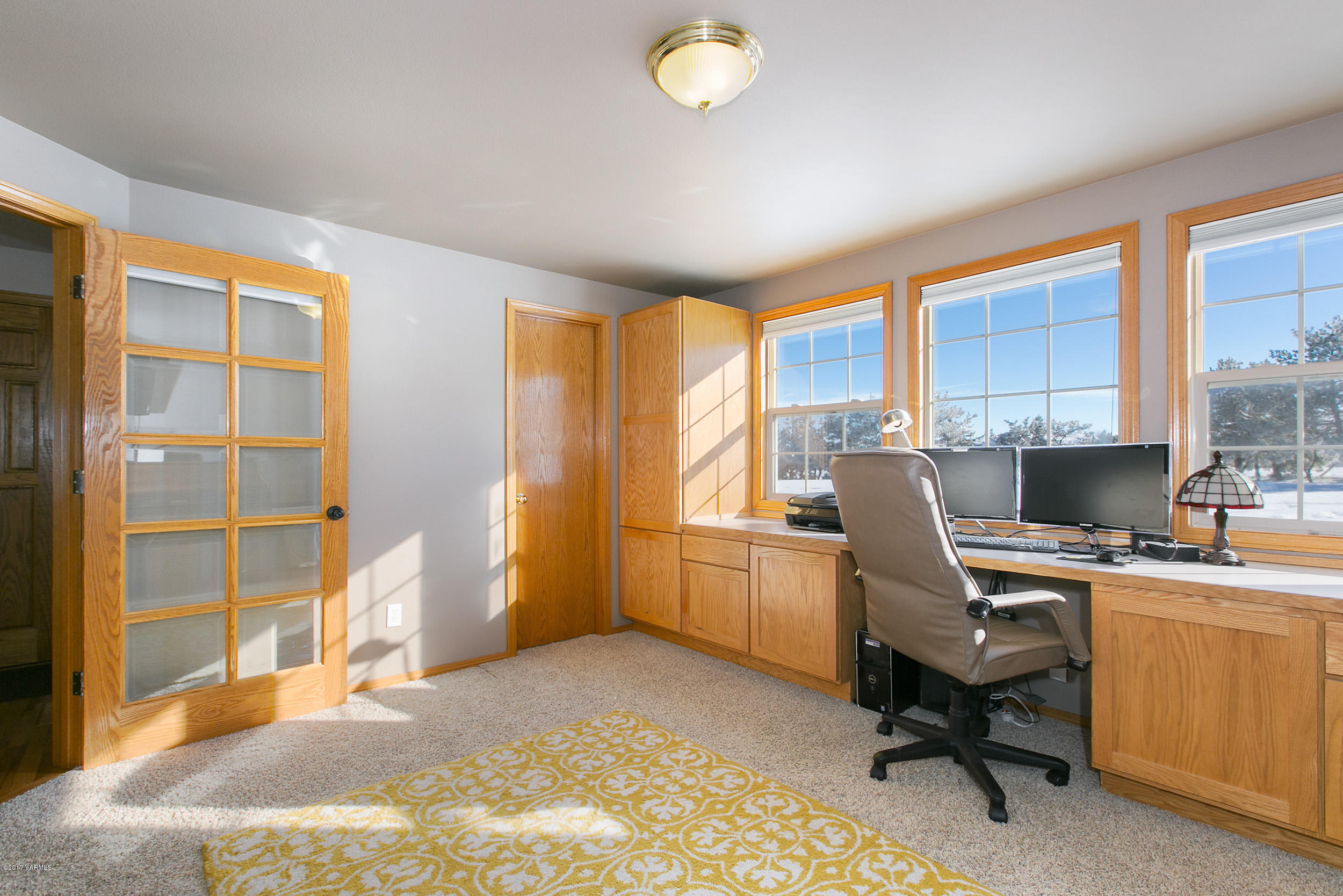 3603 Marks Road Yakima, WA 98903 - Photo 15 of 31 a view of a workspace with furniture and a window