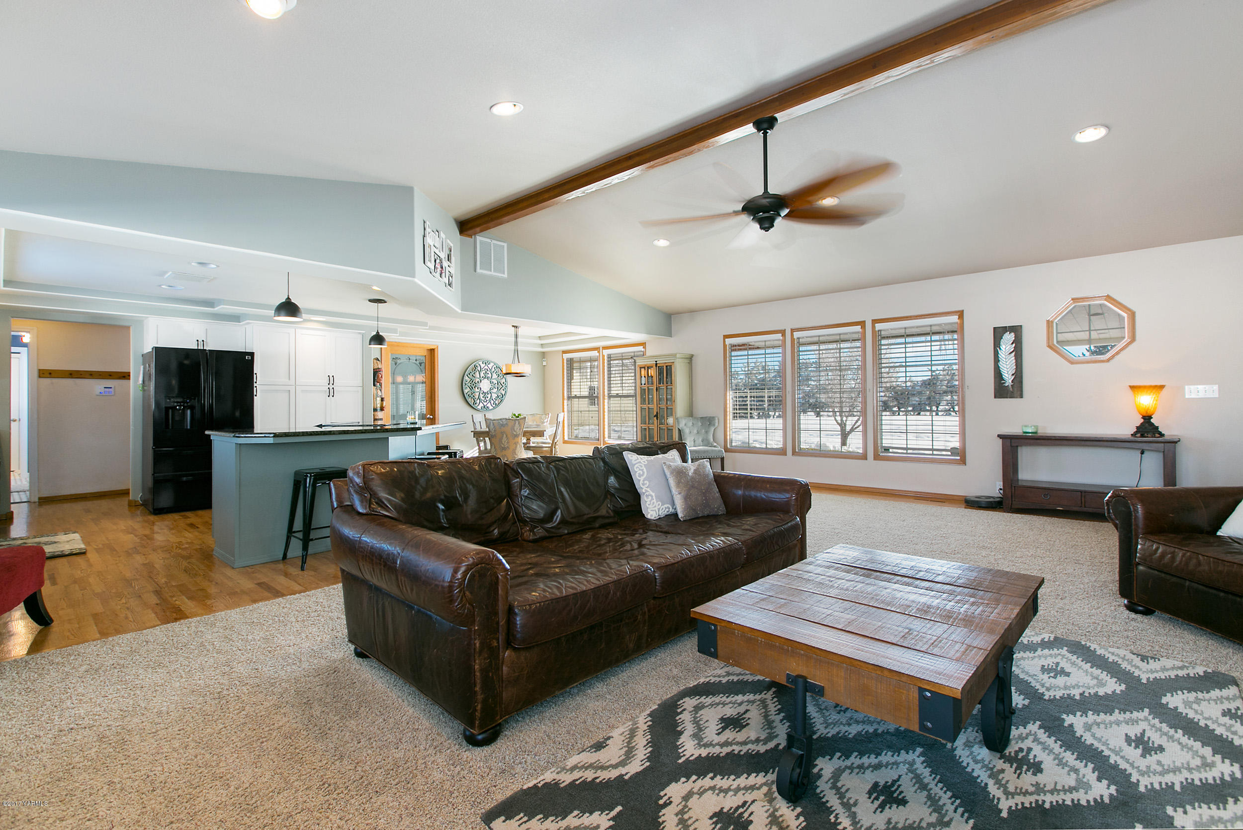 3603 Marks Road Yakima, WA 98903 - Photo 4 of 31 a living room with furniture a table and wooden floor