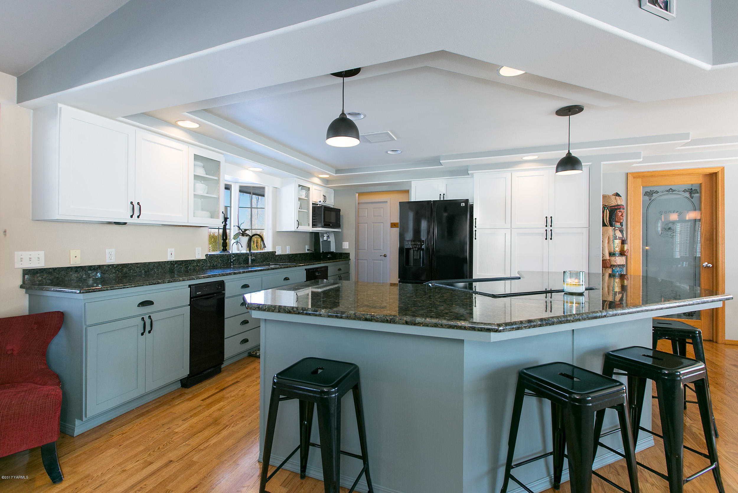3603 Marks Road Yakima, WA 98903 - Photo 6 of 31 a kitchen with stainless steel appliances granite countertop table chairs sink and cabinets