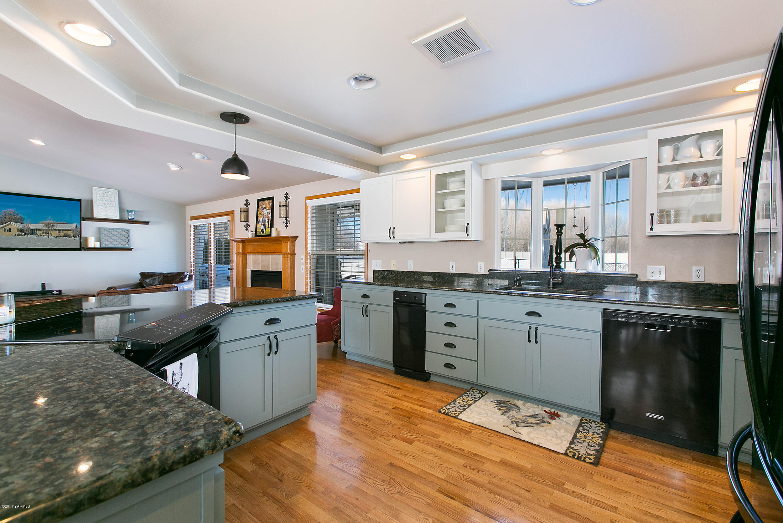 3603 Marks Road Yakima, WA 98903 - Photo 8 of 31 a kitchen with stainless steel appliances granite countertop a sink stove and refrigerator