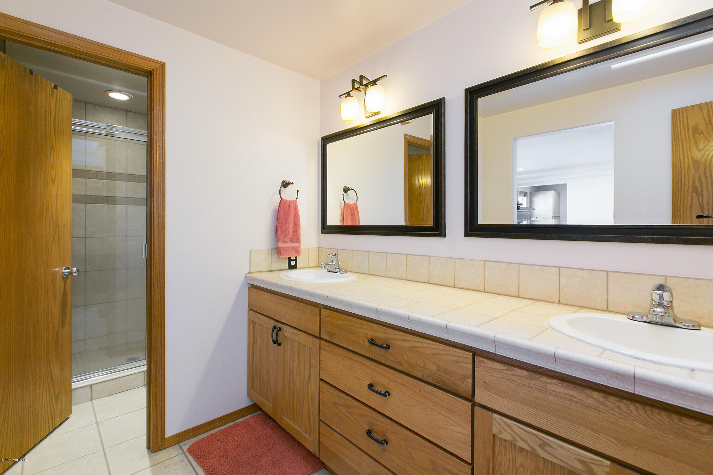 3603 Marks Road Yakima, WA 98903 - Photo 10 of 31 a bathroom with a sink and a mirror
