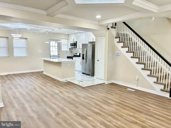a view of kitchen and utility room