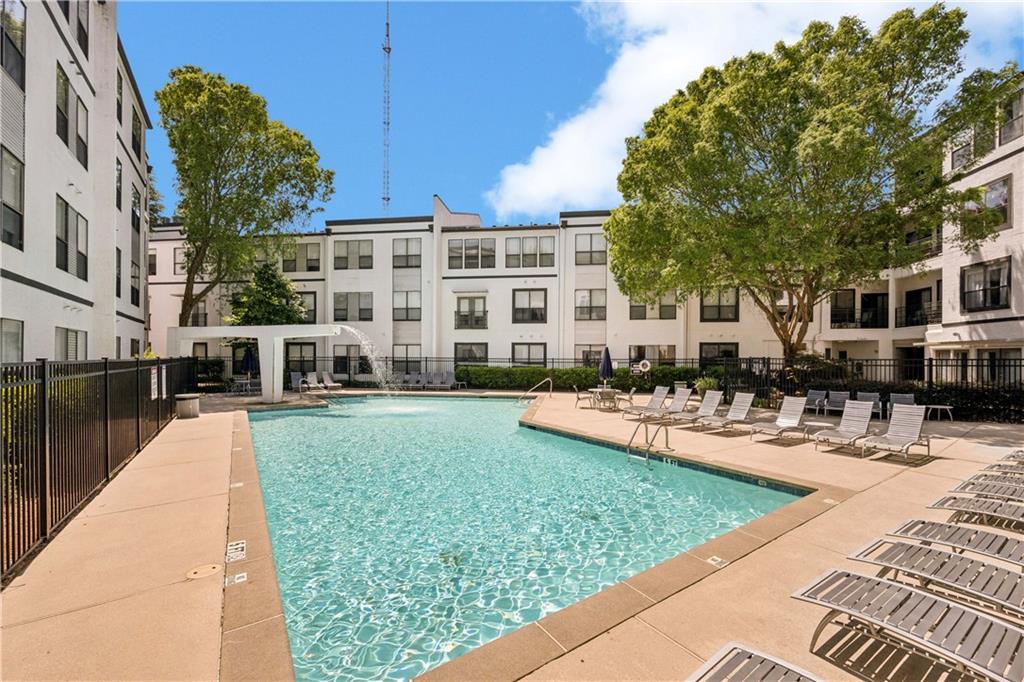 821 Ralph McGill Boulevard Northeast, Unit 2113 Atlanta, GA 30306 - Photo 12 of 29 a view of a house with swimming pool
