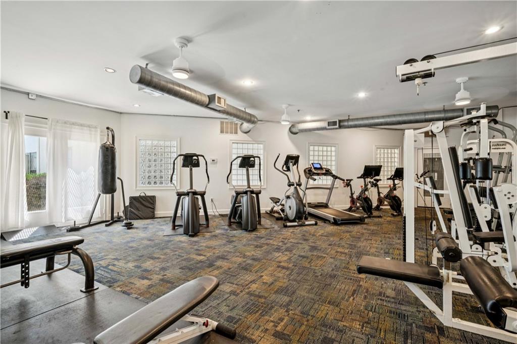 821 Ralph McGill Boulevard Northeast, Unit 2113 Atlanta, GA 30306 - Photo 16 of 29 a view of a room with gym equipment
