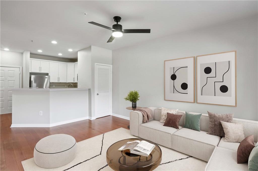 821 Ralph McGill Boulevard Northeast, Unit 2113 Atlanta, GA 30306 - Photo 3 of 29 a living room with furniture and a rug