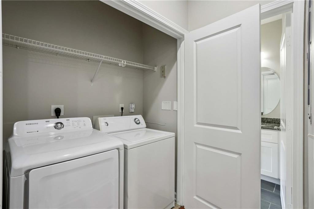 821 Ralph McGill Boulevard Northeast, Unit 2113 Atlanta, GA 30306 - Photo 8 of 29 a utility room with dryer and washer