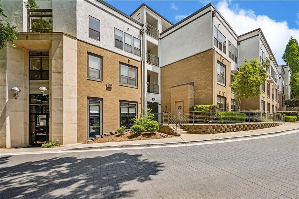 821 Ralph McGill Boulevard Northeast, Unit 2113 Atlanta, GA 30306 - Photo 9 of 29 front view of a building with a street