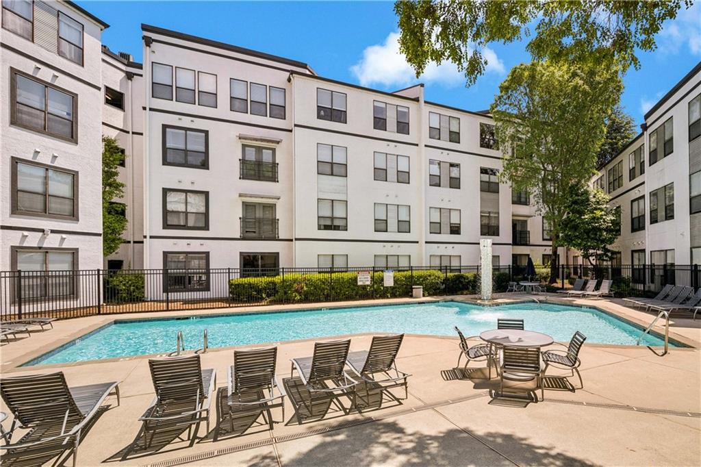 821 Ralph McGill Boulevard Northeast, Unit 2113 Atlanta, GA 30306 - Photo 10 of 29 a building view with outdoor seating space