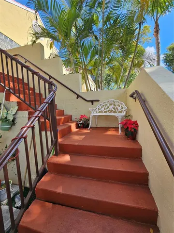a view of entryway with stairs