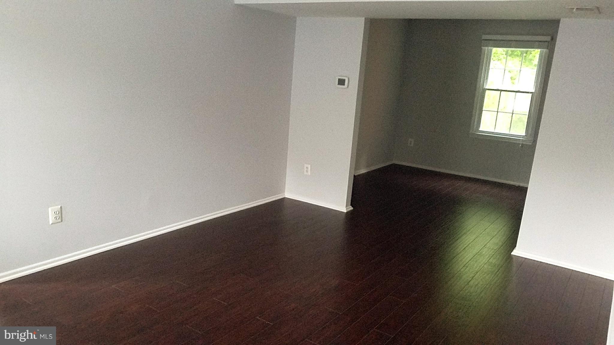 5525 Miles Court Springfield, VA 22151 - Photo 2 of 28 Living Room Freshly Painted and New Floors
